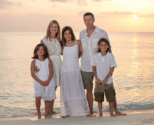 Dr. Hay with his family on the beach, depicting the personal life of The Cosmetic Dentists of Austin's team.