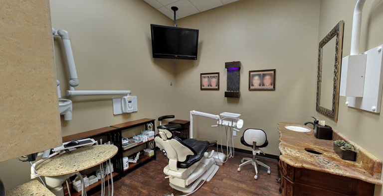 Modern and comfortable patient exam room showcasing The Cosmetic Dentists of Austin's commitment to excellence in dental care.