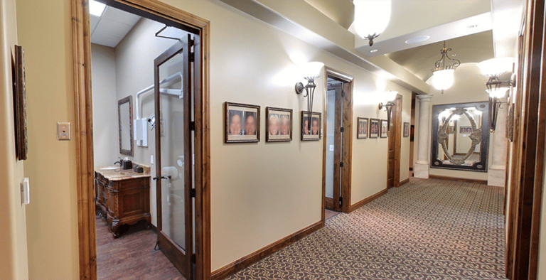Immaculately designed hallway within The Cosmetic Dentists of Austin, reflecting the practice's attention to detail.